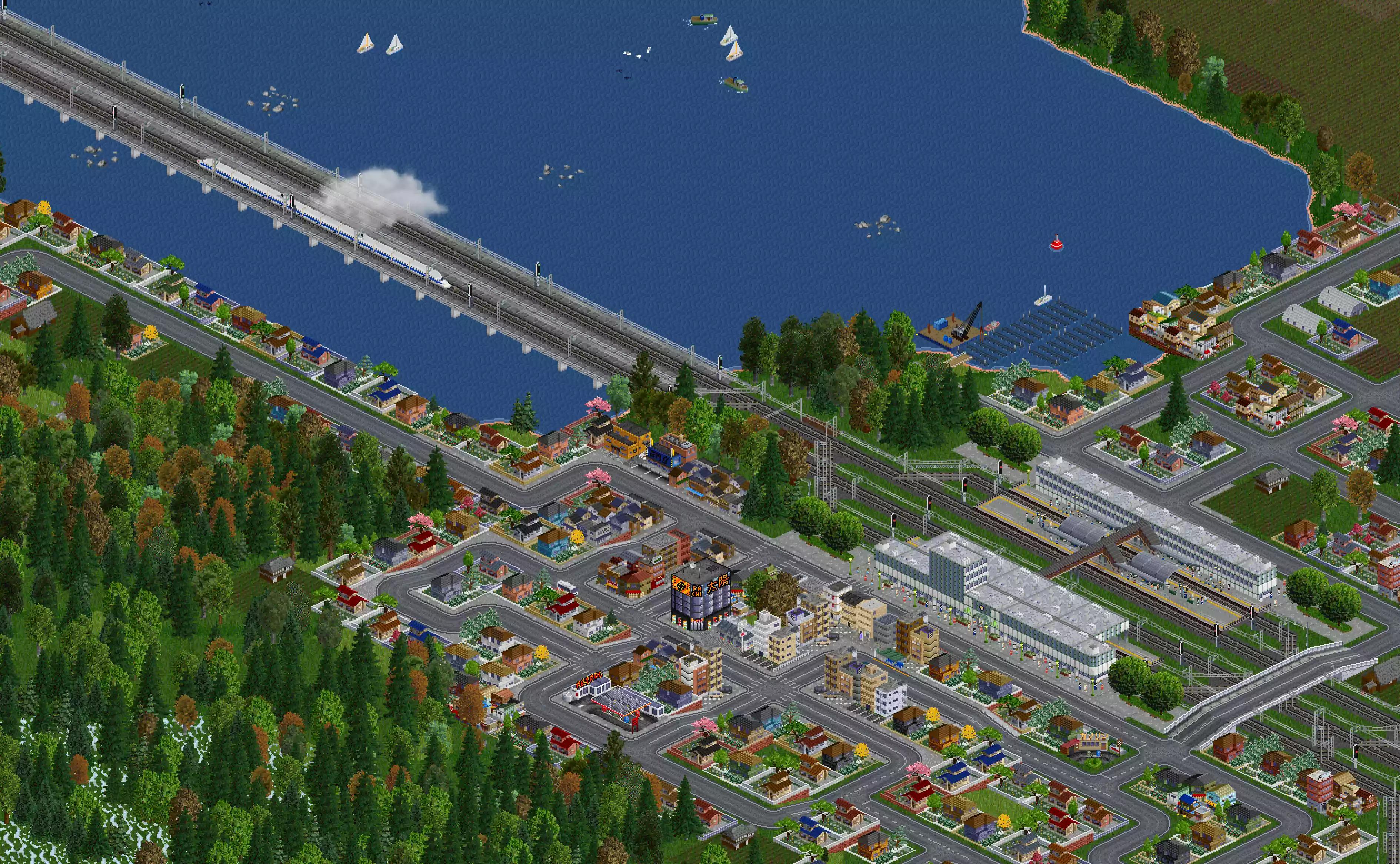 A scenic town view with a riverbank