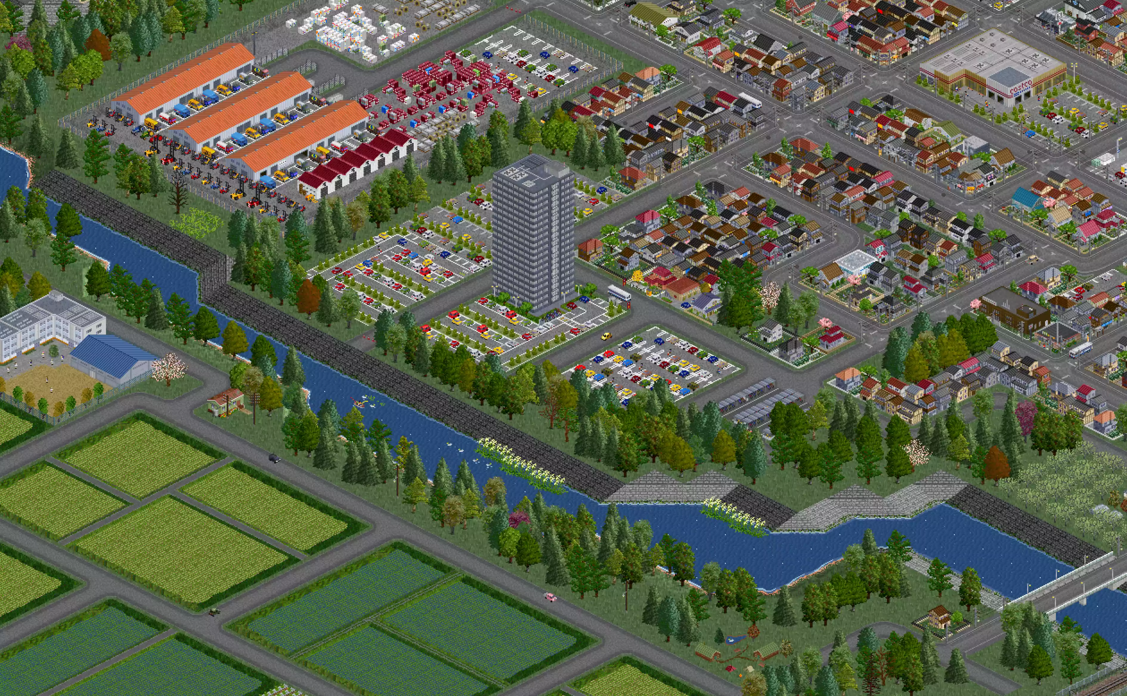 A tree-lined town edge with a path